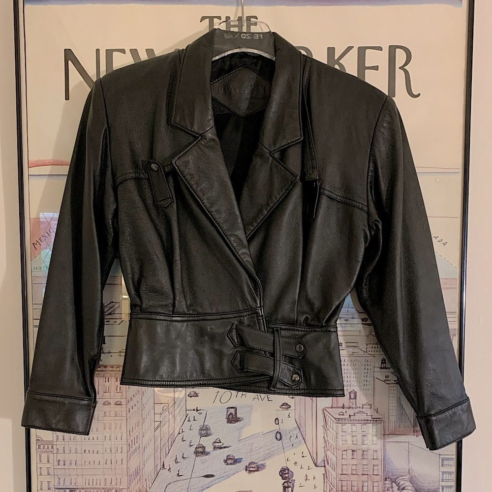 Vintage 90’s leather jkt with slight peplum padded shoulders snap & strap detail